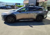 subaru e-outback 4e-experience in color brilliant bronze side left view